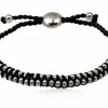 Armbånd med faldskærmssnor og stålkugler