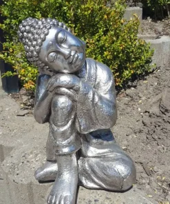 Buddha skulptur i sølv
